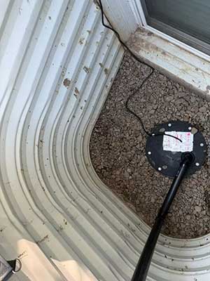 efficient window well installation with sump pump1